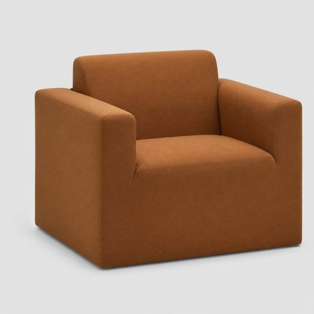 Housse cognac sur fauteuil club cubique